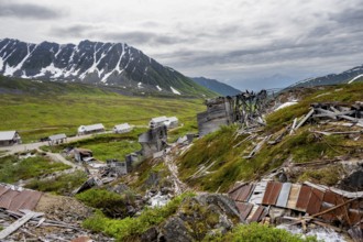Crumbling mill and former Gold Mine Independence Mine building in mountainous landscape,