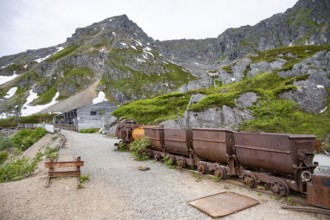 Old rusted mine trucks from the former Gold Mine Independence Mine in mountainous landscape,
