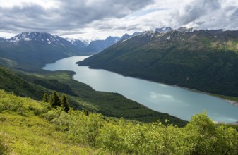View of blue lake and mountains on Twin Peaks Trail, Eklutna Lake, Chugach Mountains, Chugach State