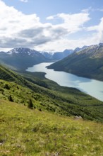 View of blue lake and mountains on Twin Peaks Trail, Eklutna Lake, Chugach Mountains, Chugach State