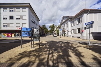 Traffic sign end of pedestrian zone, registry office, wine distillery house, residential buildings