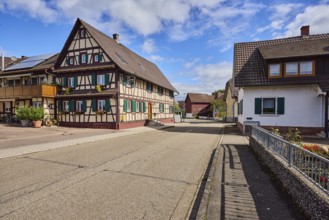 Historic half-timbered house, houses, general development, street, blue sky, cumulus clouds,