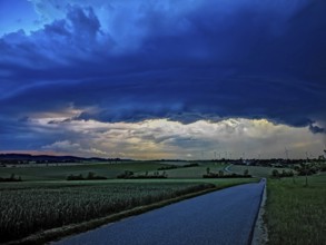 Supercell, approaching thunderstorm with impressive and threatening cloud formation, a thunderstorm