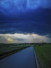 Supercell, approaching thunderstorm with impressive and threatening cloud formation, a thunderstorm