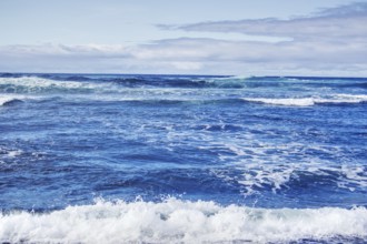 Extensive ocean with foaming waves under a partly cloudy sky, Playa del Janubio, Yaiza Lanzarote