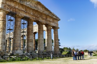 Elymian Doric Temple, ruins, ancient city of Segesta, tourist group, archaeological site on Monte
