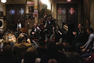 Jazz concert with enthusiastic audience in the historic Preservation Hall, New Orleans, Louisiana,