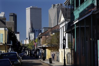 View of French Quarter streets with modern skyscrapers in the background, New Orleans, Louisiana,