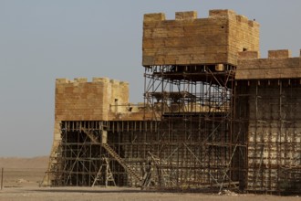 Great wall with scaffolding in a film set ready for shooting, Ouarzazate, Morocco