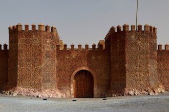 Large gate and fortified walls of a medieval fortress, Ouarzazate, Morocco