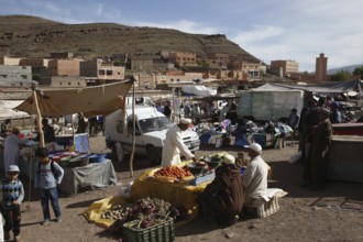 Lively market with numerous stalls and busy people in Msemrir, Msemrir, Region, MA