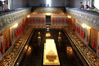 Magnificent interior view of the Hassan Mausoleum with richly decorated tomb and decoration, Rabat,