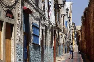 Narrow street with colorful windows and old facades in the Medina of Safi, Safi, Doukkala-Abda,