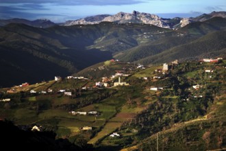 Extensive view of the Rif Mountains with scattered houses and fields, Tetouan, Morocco