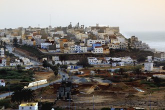 View of the city of Sidi Ifni with densely packed buildings on the coast, Sidi Ifni, Guelmim-Oued