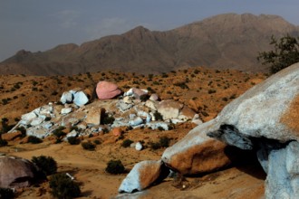 Rocky hills with colour-contrasting stones in the desert area of Tafraoute, Tafraoute, Souss-Massa,
