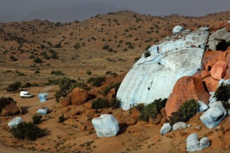 Painted rocks in the vast desert landscape of Tafraoute, created by Jean Verame, Tafraoute,