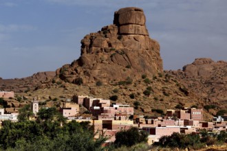 Chapeau Napoléon rock formation above a village in Tafraoute, Tafraoute, Souss-Massa, Morocco