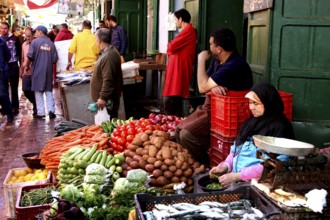 Fresh vegetables galore at a charming market stall in a lively alley, Tetouan, Medina, Morocco