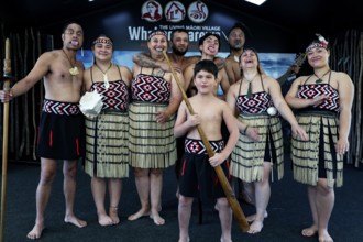 Maori group wearing traditional clothing at a cultural performance in Whakarewarewa, Rotorua, Bay