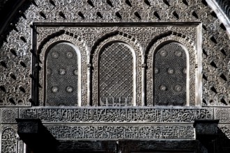 Detailed façade of Medersa Bou Inania with artistic stucco work, Fez, Fès-Boulemane, Morocco