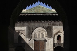 Traditional gate in Medersa Bou Inania with Gothic arches, Fez, Fès-Boulemane, Morocco