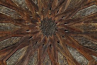 Complex wooden ceiling with geometric patterns in Medersa Bou Inania, Fez, Fès-Boulemane, Morocco
