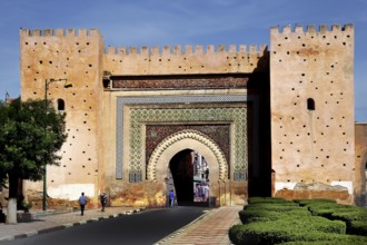 Impressive decorated gate with brick pattern shining in the sun, Meknes, Fès-Meknes, Morocco