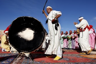Traditional dances with drum accompaniment and colorful robes at the Fête des Roses, El Kelâa