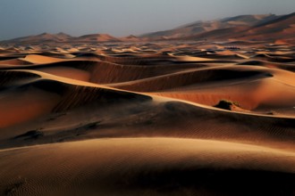 Endless sand dunes of the Erg Chebbi desert under a blue sky, Erg Chebbi, Morocco