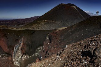 Majestic view of Mount Tongariro and Mount Ngauruhoe with boulders in the foreground, Tongariro