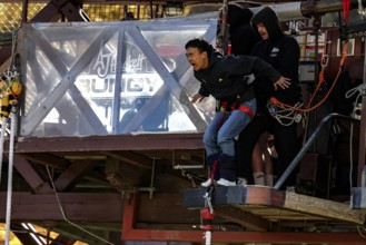 Person ready to jump for bungee jumping from Kawarau Bridge, Queenstown, Otago, New Zealand