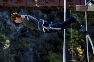 Person in free fall bungee jump from Kawarau Bridge, Queenstown, Kawarau Bridge, New Zealand