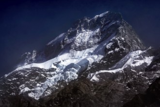 Snow-capped mountains with glaciers under night sky in Hocker Valley, New Zealand, zero