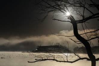 Mystical morning on Lake Rotorua with steamboat and sunrise, Rotorua, Bay of Plenty, New Zealand