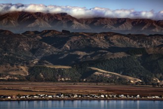 View of Bluff Hill on mountain landscape under cloudy sky, Napier, Hawke's Bay, New Zealand