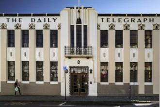 Art deco façade of a newspaper building with distinctive columns, Napier, Hawke's Bay, New Zealand
