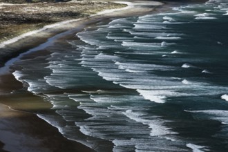 Ninety Miles Beach near Cape Reinga shows wave-rich beaches with curved shores, Cape Reinga,