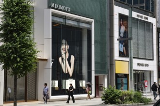 Large shop window with impressive advertising poster in Ginza, Tokyo, Tokyo, Japan