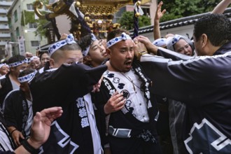 Attendees at the lively Sanja Matsuri shrine festival in traditional clothes, Tokyo, Asakusa, Japan