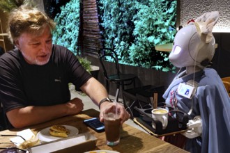 Interaction between humans and robots at Avatar Robot Café in Tokyo, Tokyo, Japan