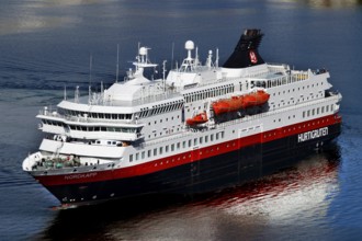 Close up Hurtigruten ferry boat, majestically on open water, Hammerfest, Finnmark, Norway