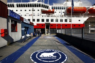 Hurtigrutenkai in Hammerfest with Hurtigruten ship and Isbjornklubben, Hammerfest, Norway