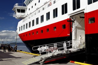 Landing area in Hammerfest with an imposing Hurtigruten ship and open gangway, Hammerfest, Norway
