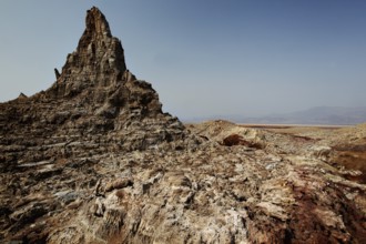 Impressive rock mountain in the barren salt canyon of Dallol, zero