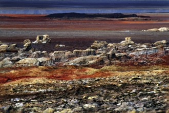 Dallol's impressive rocky landscape in warm shades of red and brown, zero
