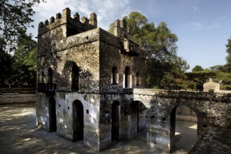 Historic stone architecture with arches and a traditional character in the bath of Fasilidas,