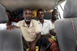 Men in a car in Kusrawad, vehicle seat, male passengers, Kusrawad, zero