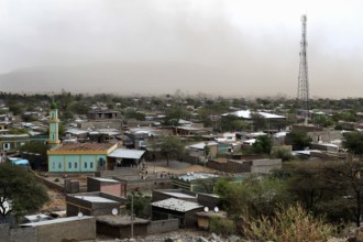Panoramic view of a city with minaret and transmission tower, Kwila, Ethiopia