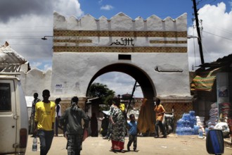 The historic Shoa Ber western gate of Harar with people in front of it, Harar, Harari, Ethiopia